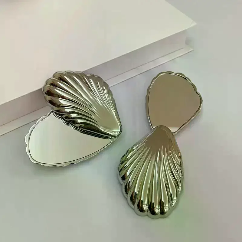 Miroir de maquillage pliable en métal, forme mini coquillages, non fragile et portable, double face, compact, adapté pour les voyages