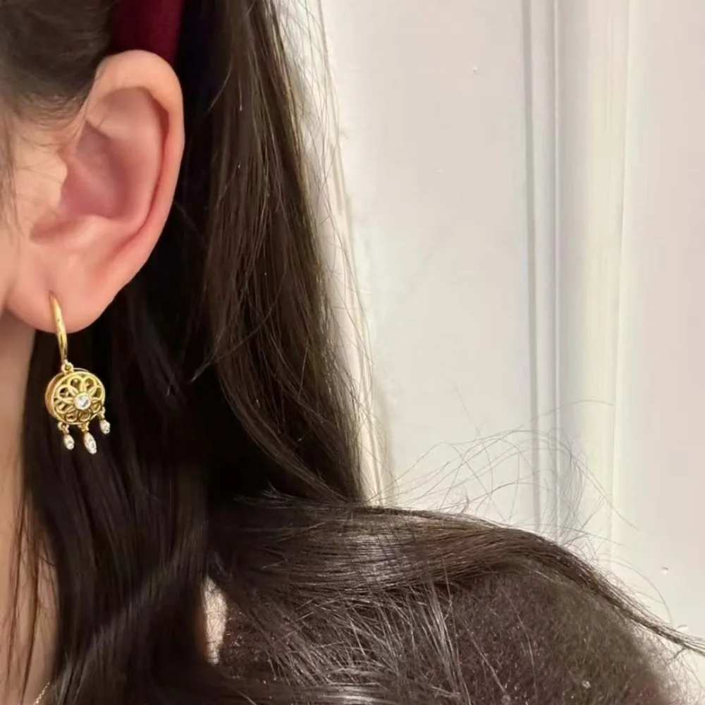 Flowery silk dream catcher  retro hollow fringe modeling light luxury fashion temperament senior earrings 9999gold