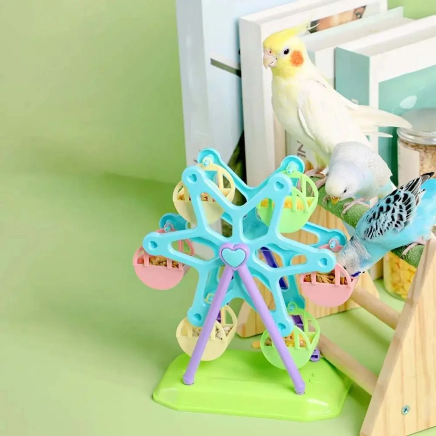 Exciting and vibrant multi-colored Ferris wheel toy for lovebirds and cockatoos. This interactive windmill design features a rot