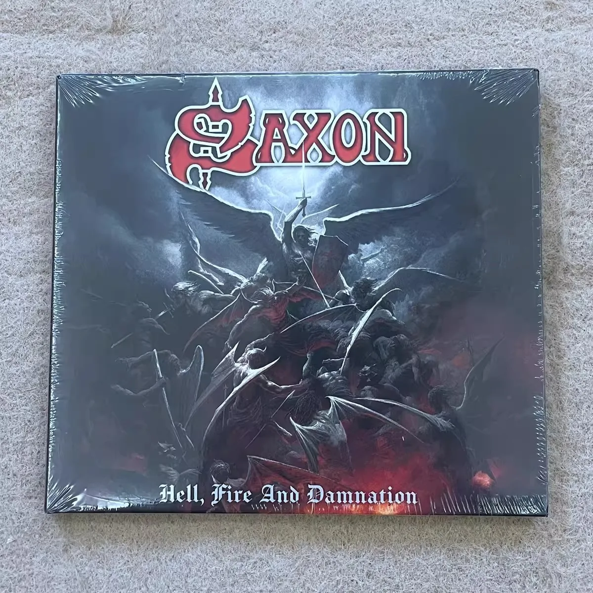 

Saxon Hell, Fire and Damnation CD Classic Heavy Metal Powerful Riffs Strong Vocals Energetic Rock Music for Metal Fans