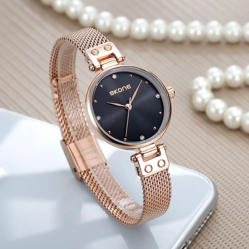 SKONE นาฬิกาผู้หญิง สไตล์เกาหลี Ins แฟชั่น เบา หรูหรา อินเทรนด์ นักเรียน นาฬิกาสายตาข่ายเหล็กอารมณ์เรียบง่าย
