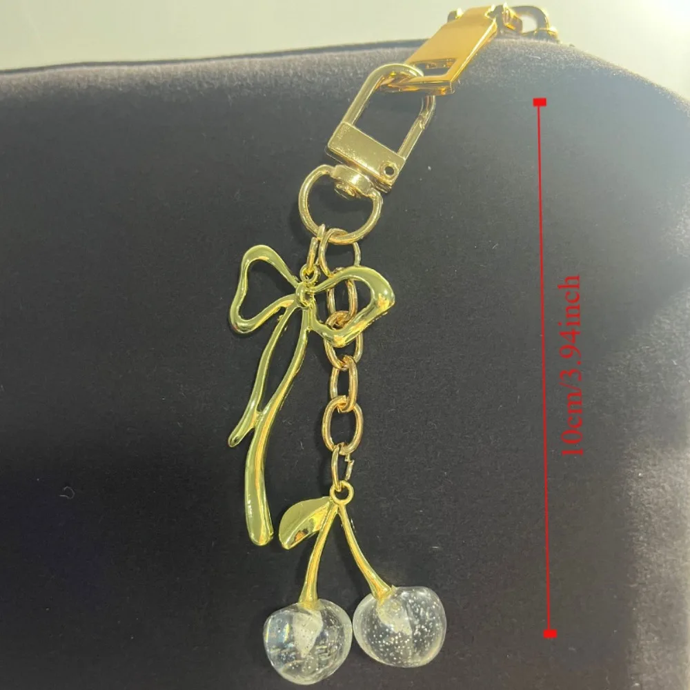Nouveau Pendentif de sac cerise rouge, porte-clés avec nœud en cristal, accessoires de sac en alliage pour femmes