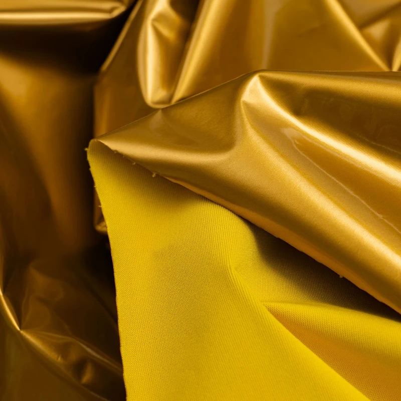 

Gold Metallic Stretch PU Leather Fabric Super Shiny Soft Mirror Luxury Style Finish Leggings Jacket DIY Sewing Accessories