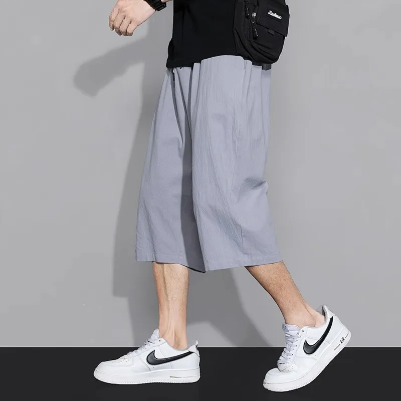 กางเกงขาสั้นผู้ชายทรงตรงแบบสบายๆ น้ำหนักเบา ผ้าบางเบา มีเชือกผูกเอว เหมาะสำหรับใส่ลำลอง ออกกำลังกาย หรือไปเที่ยวชายหาด