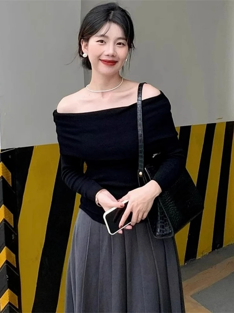 

Sexy Black One-Shoulder Long Sleeve Top Korean Style Autumn Winter High Quality Fashion Design Sense New 2026 Women's Knitted...