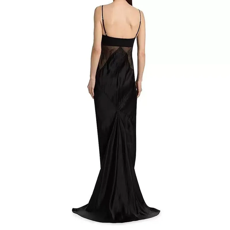 Lady's black long-sleeved strapless dress with sheer net fabric and stretchable design for a formal party gown. 2026 new style.