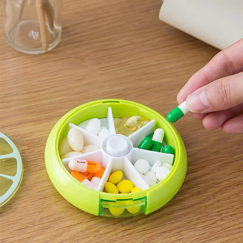 Caja redonda con siete compartimentos para medicamentos, caja de almacenamiento de medicamentos para una semana, caja pequeña para llevar medicamentos contigo
