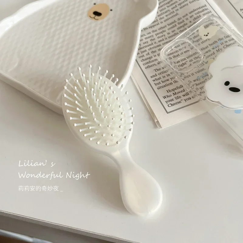 Brosse à cheveux pour petites filles, 1 pièce, simple, mode, couleur unie, peigne à coussin d'air pour enfants, joli outil de soins capillaires