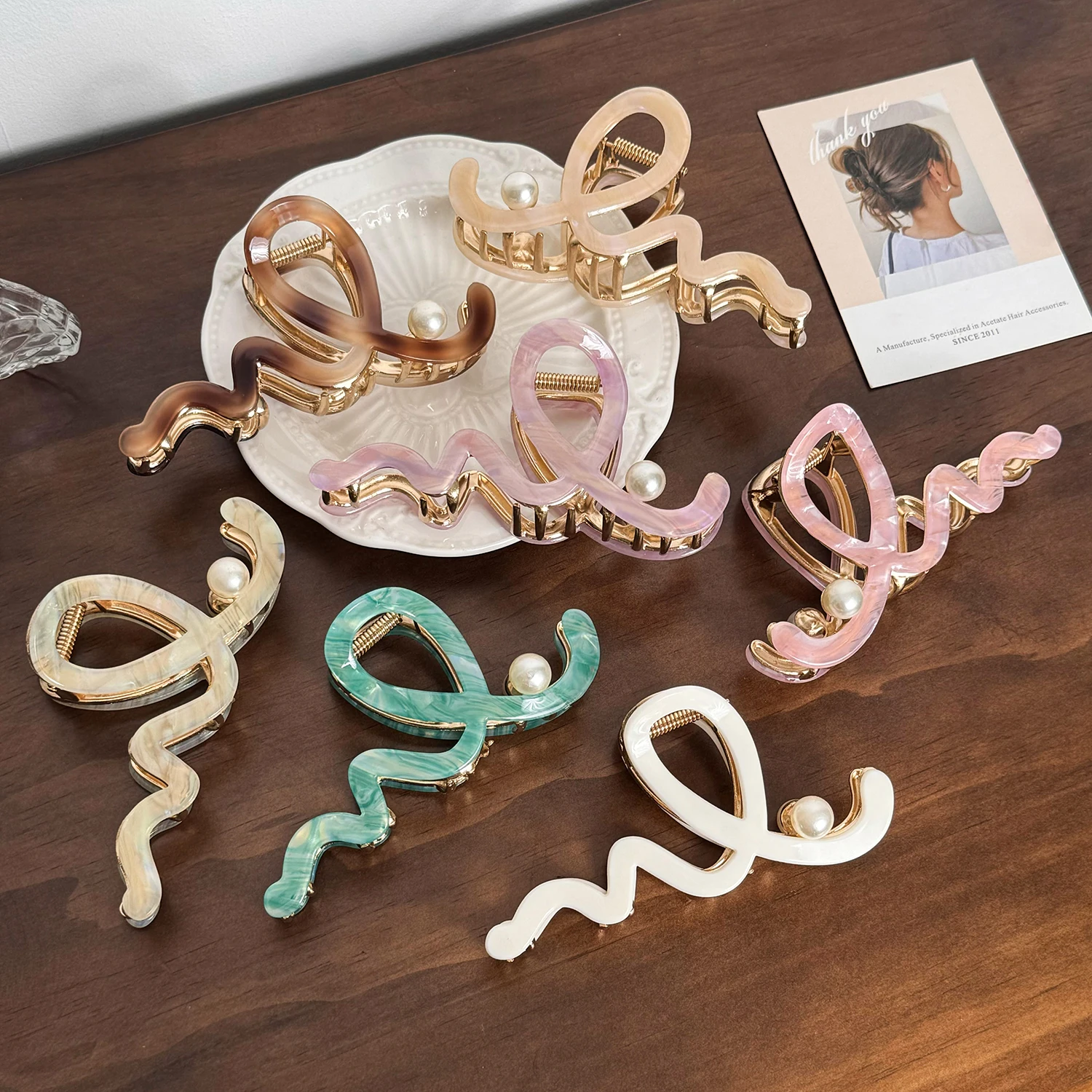 

Large Size Wave Shape Pearl Acrylic Hair Caw For Women