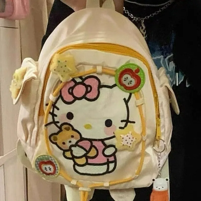 Mochila con estampado de Hello Kitty Sanrio, mochila para estudiantes a prueba de polvo, mochila de viaje multifuncional Simple, regalo de Navidad para niña