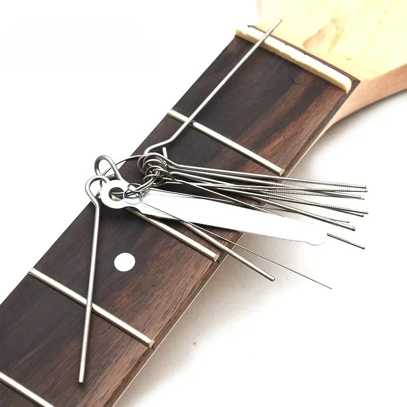 

2 шт. портативных инструментов для ремонта гитар: напильники для слотов и грифов, серебристые, из нержавеющей стали, для самостоятельного ремонта гитар