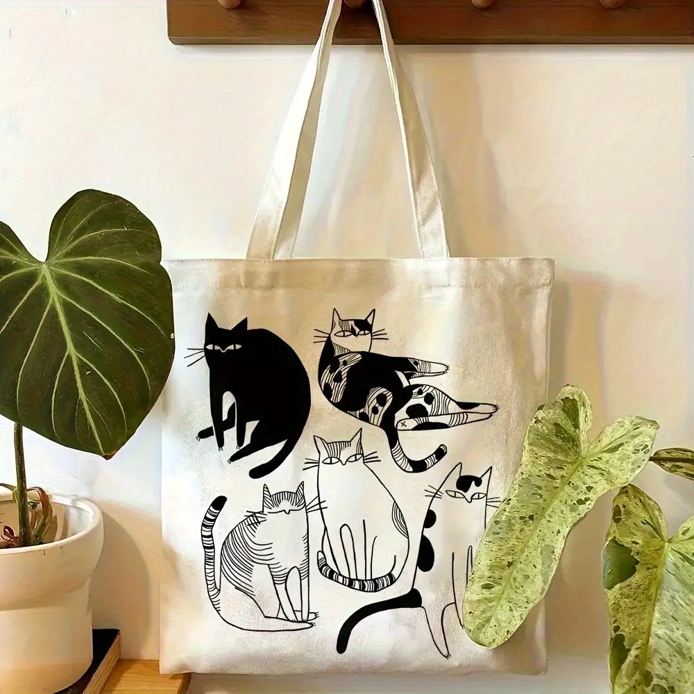 A Modisches Katzenmuster pattern print canvas tote bag, suit