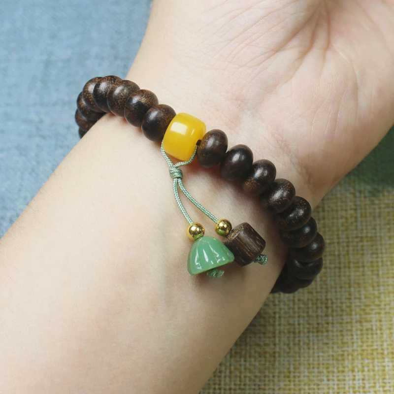 Tiger stripe agarwood abacus bead bracelet with small lotus pendant and Buddhist prayer beads - view 5