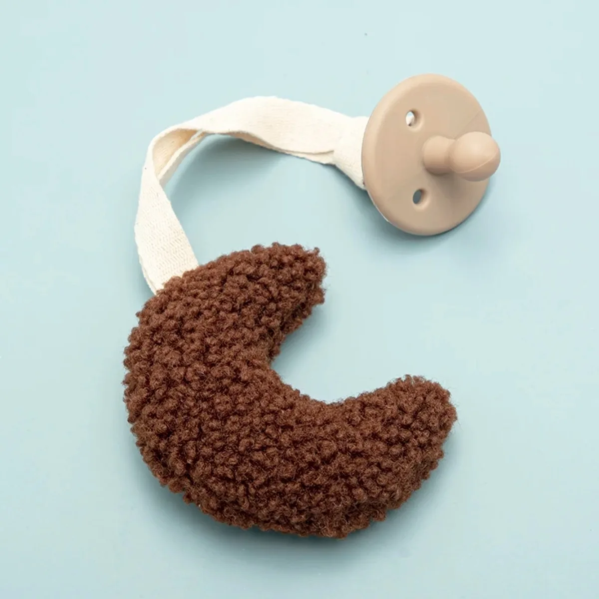 

Star Moon Pattern Sherpa Pacifier Chain, BPA-free silicone soother holder and decorative dummy clip. Featuring lovely look and reliable quality. It is a sweet gift choice for baby shower, newborn parties and holiday presents for new parents.