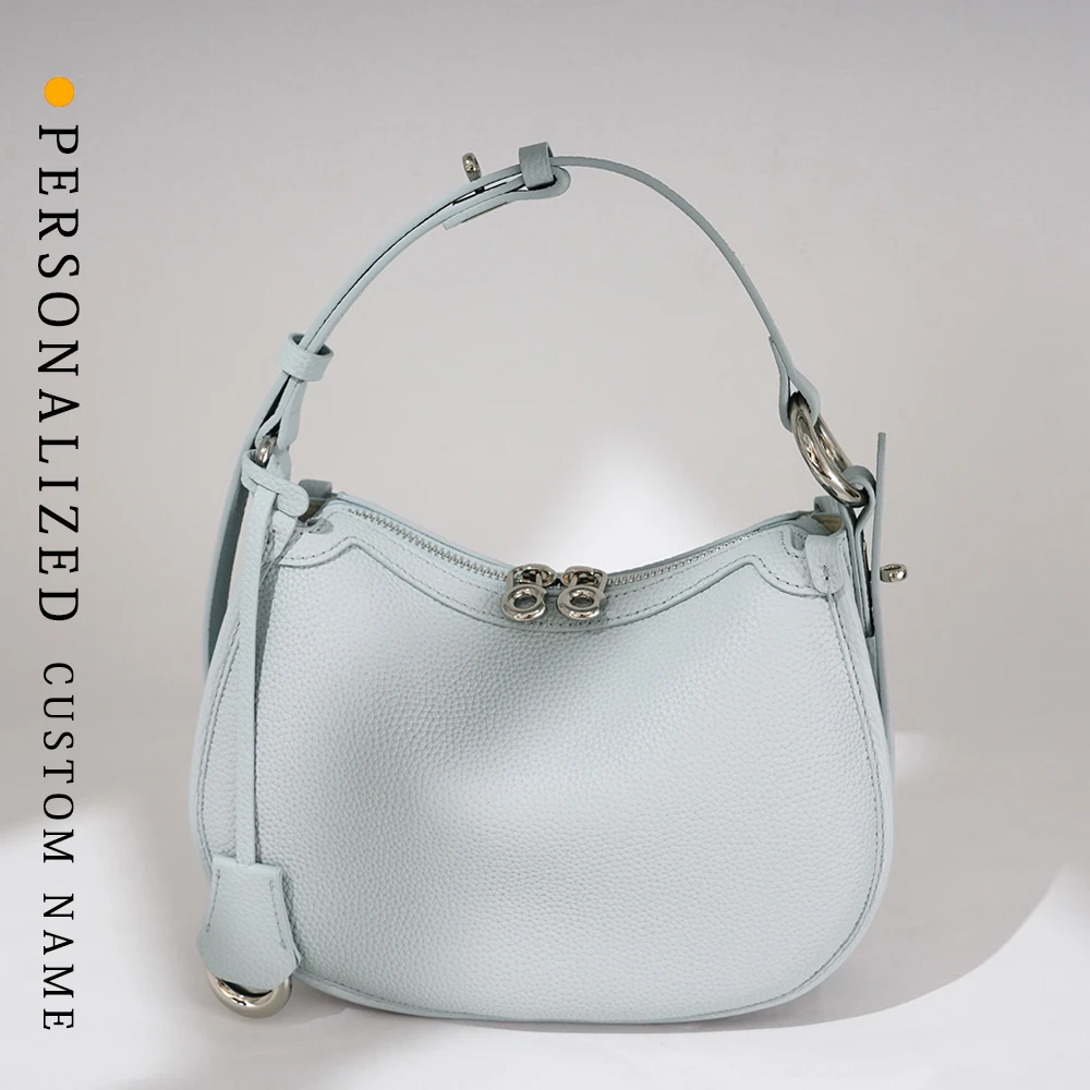 

High-quality cowhide women's bag fashion new product versatile simple niche one-shoulder armpit bag crescent moon bag custom
