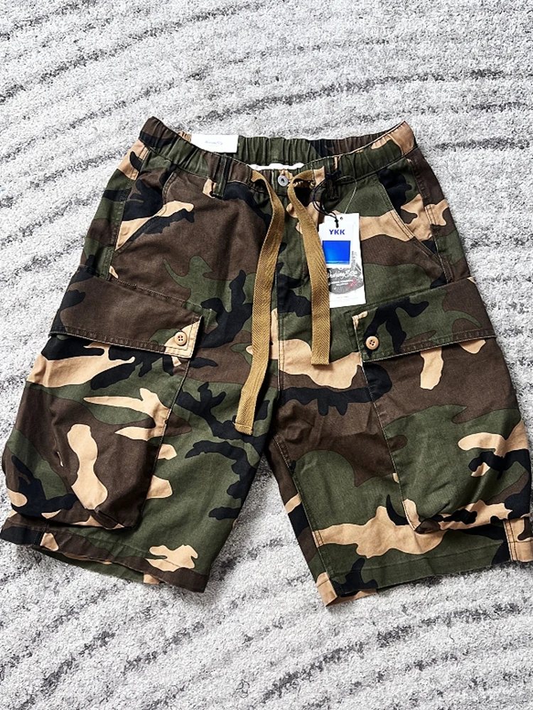 

Vintage distressed M-1944 camouflage tree branch pattern multi-pocket workwear shorts