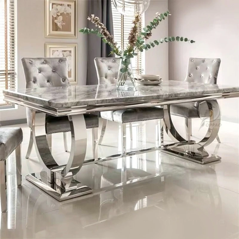 

Modern light luxury marble dining table and chair combination Italian rectangular simple household stainless steel dining table