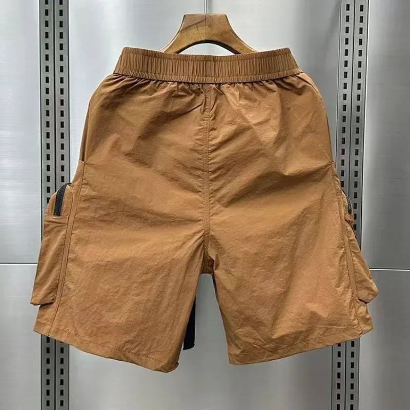 Pantaloncini cargo da uomo solidi larghi con cerniera elastico in vita pantaloni corti multitasche per uomo larghi larghi nuovi in abiti firmati Y2k