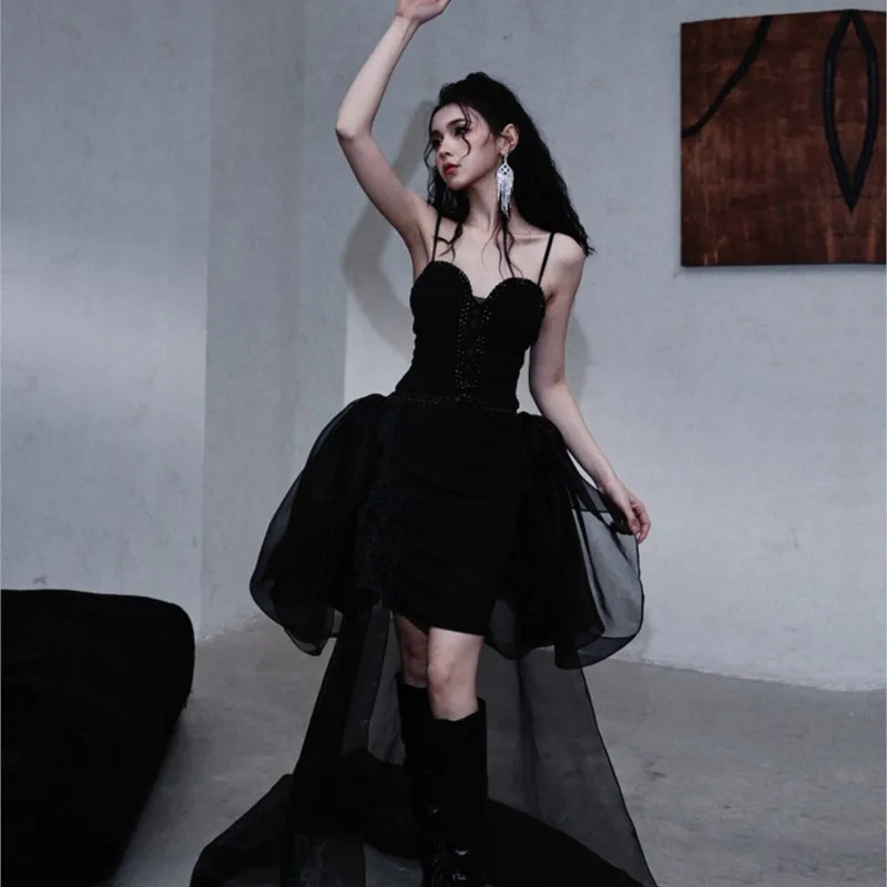 

Dark style halter design with a flowing ribbon mini dress