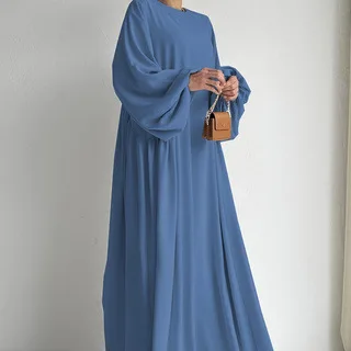 دبي فساتين مسلمة متواضعة مطوي بلون عباية إسلامية بأكمام منتفخة فستان طويل امرأة عبايات عصرية إسلامية