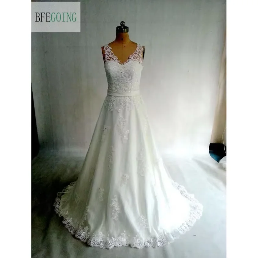 

Кружевные тюлевые свадебные платья по индивидуальному заказу со шлейфом длиной до пола и аппликациями без рукавов Свадебные платья трапециевидной формы