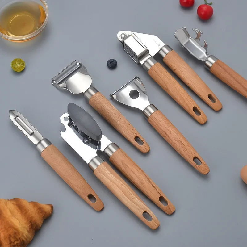 

Baking Set 9 Pcs ，Wooden Handle Kitchen Small Tool ，can opener, peeler, tray holder, fruit scoop, egg beater, ginger slicer