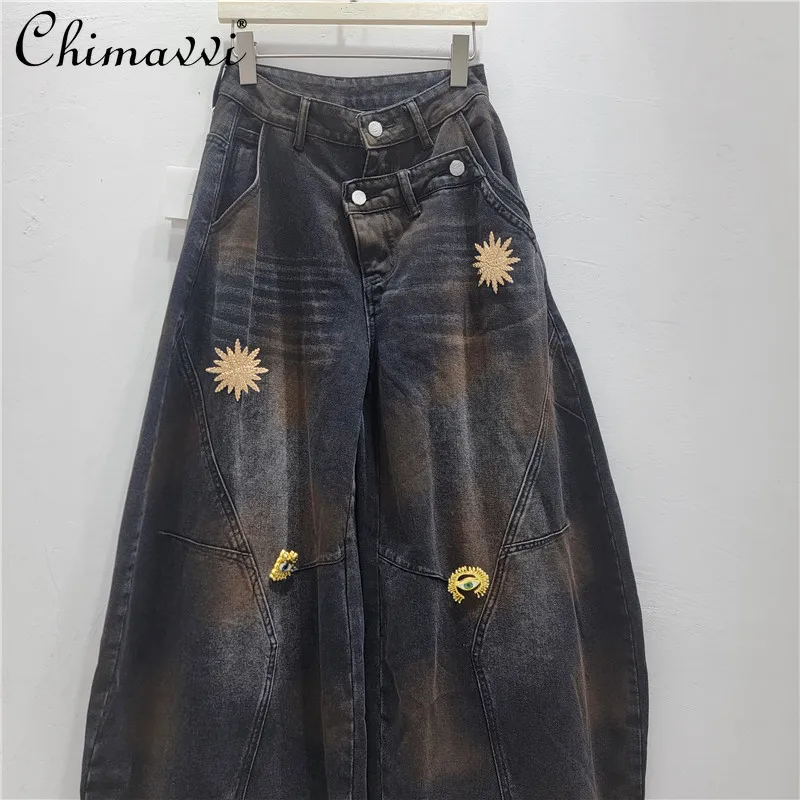 

American-style Metal Buckle Distressed Denim Curved Hem Pants Women New Spring Fashion Loose Wide-leg Casual Work Pants 2026 New