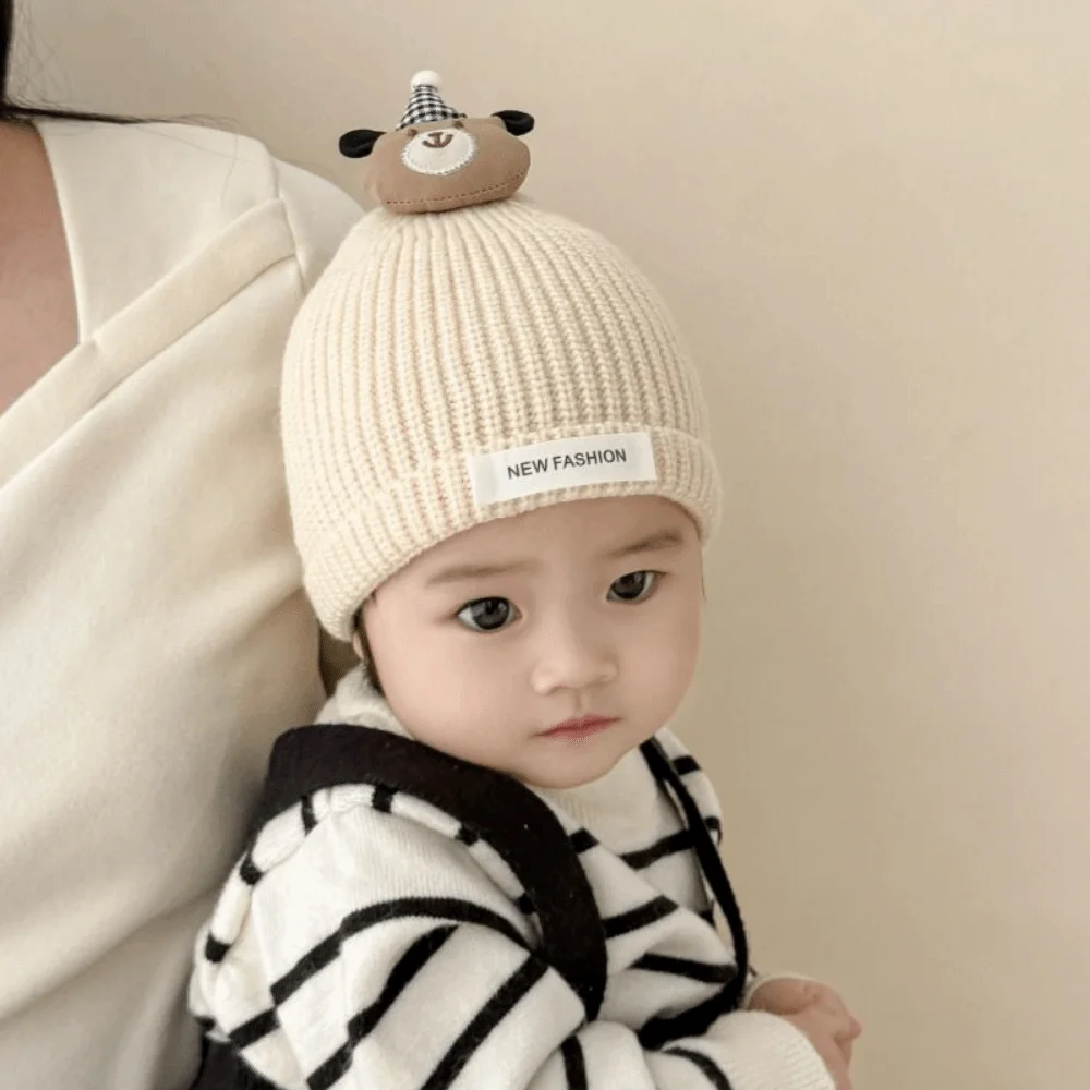 

Зимняя вязаная шапка с мультяшным медведем для малышей, дышащая, морозостойкая, термошапка для малышей, однотонная, с защитой ушей