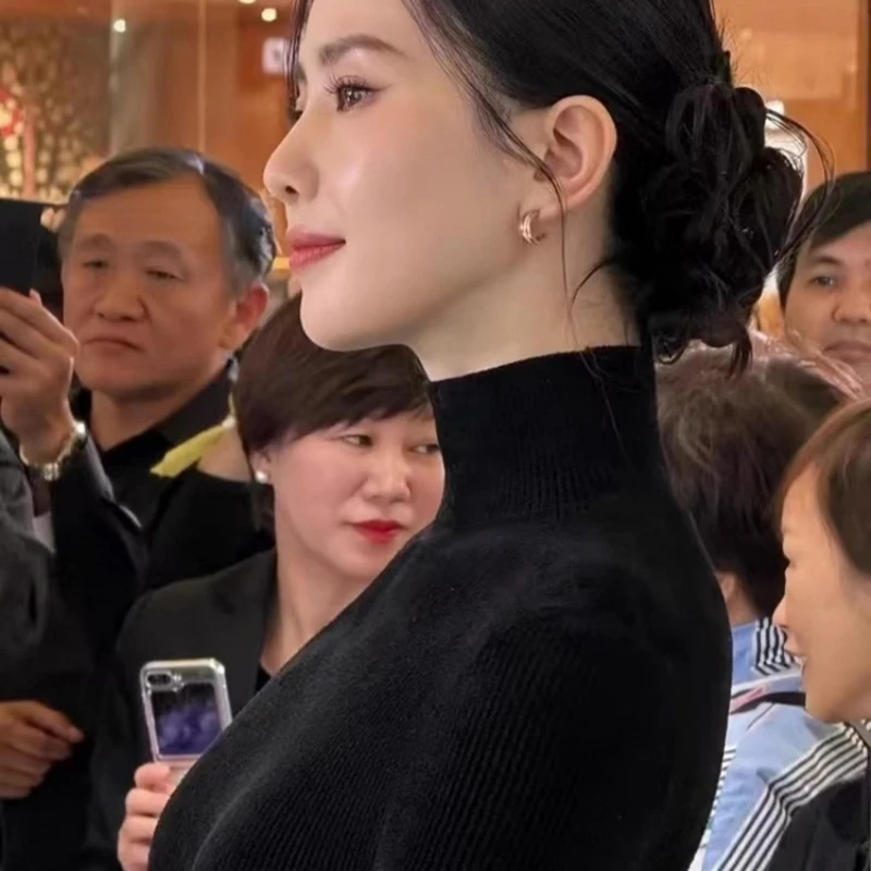 

Black bottoming shirt female semi-turtle neck tight-fitting 100% pure cashmere sweater inside.