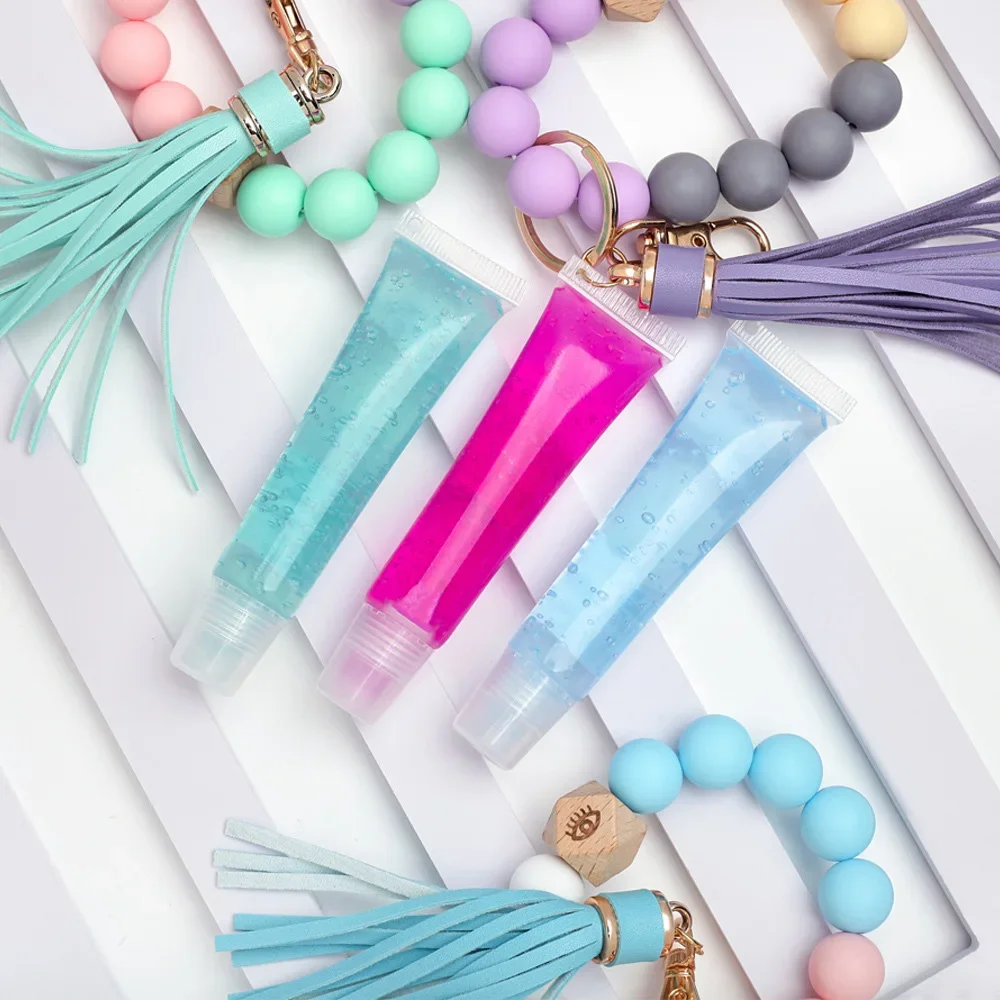 

5mlLip Oil Custom Logo Pigment Tassel Pendant Silicone Bead Bracelet Keychain Waterproof Makeup Private Label Without Box Bulk