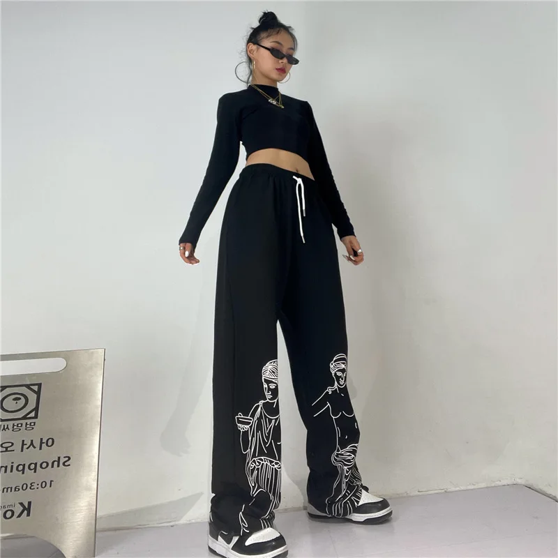 ربيع 2025 الهيب هوب شارع الجاز الرياضة الأوروبية والأمريكية مستقيم ins سراويل تقليدية النحت الأسود بنطلون المرأة