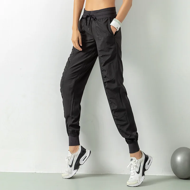 Pantaloni sportivi larghi per le donne pantaloni dimagranti ad asciugatura rapida leggings fitness da corsa casual pantaloni da yoga traspiranti set