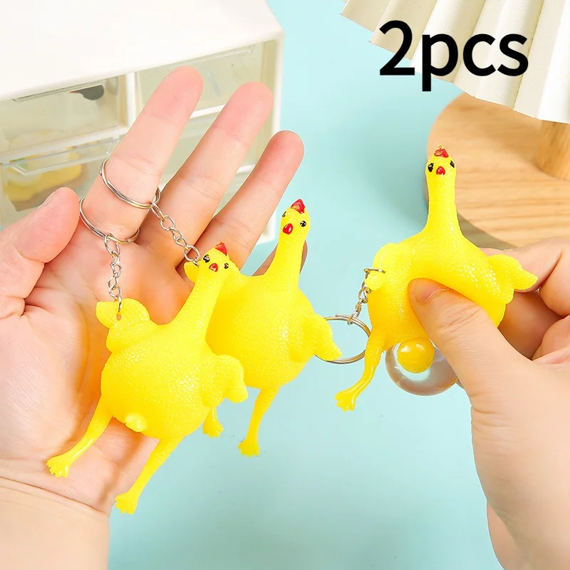 1/2 stuks grappige mini kip sleutelhanger, knijpbare TPU eierleggende eend speelgoed, creatieve nieuwigheid sleutelhanger, humoristische gag cadeau, geel