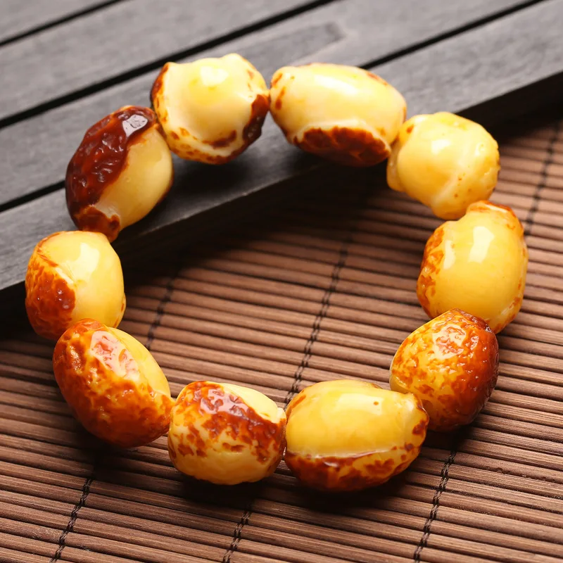 

Live Exhibition Baltic Chicken Oil Yellow Amber Raw Stone Skin Old Amber Bracelet for Men and Women Barrel Bead Amber Bracelet