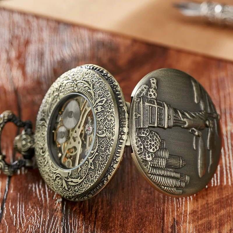 

Statue of Liberty Steampunk Mechanical Hand-wind Pocket Watch Hollow Roman Dial Skeleton Clock FOB Waist Chain Pocket Watch Gift