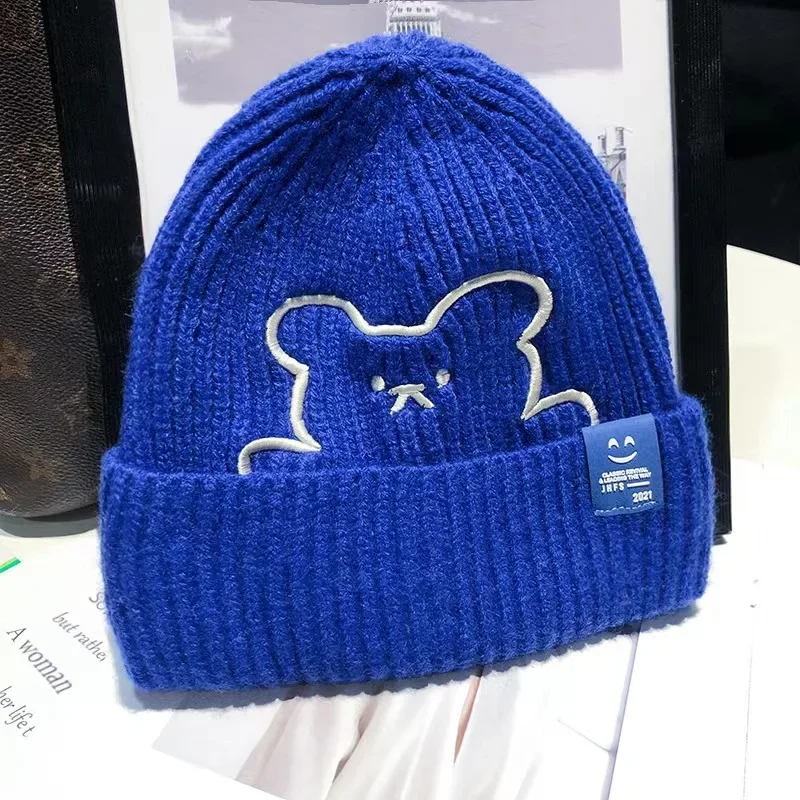 2023 New Bear Winter Wool Hat Woman Korean fashion Cap Trend Keeps Warm Ear Protection Cute Winter Knitted Hat Tide