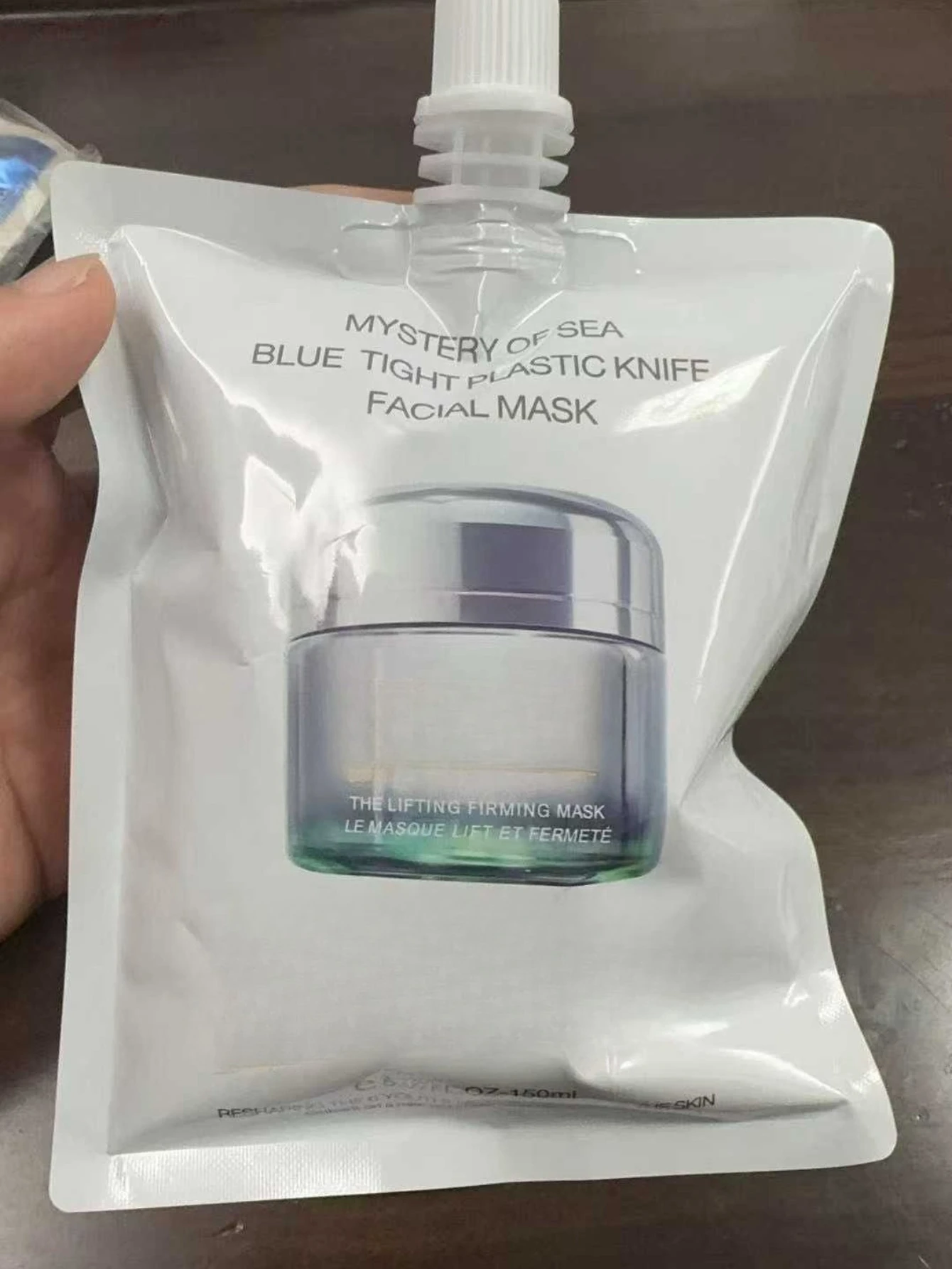 

MYSTERY OR SEA BLUE TIGHT PIASTIC KNIFE FACIAL MASK THE LIFTING FIRMING MASK 150ml
