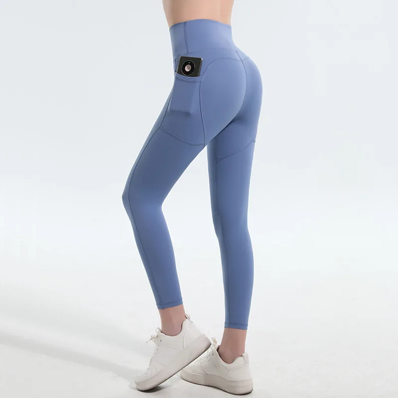 New Yoga Pants for Women Naked Peach Hip Lifting Sports Tight Fitness Pants with Double Pockets Running and Cycling Pants