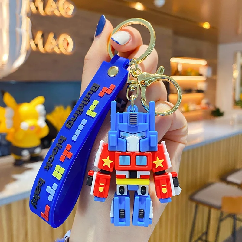 Nuovi Transformers Periferico Optimus Prime Megatron Bumblebee 3d Cartoon Car Portachiavi Zaino Ciondolo Zaino Decorazione Regalo