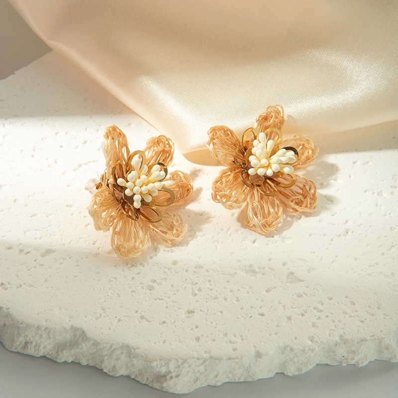 Autumn French fashion retro stainless steel ladies raffia braided white shell flower earrings holiday gift holiday date