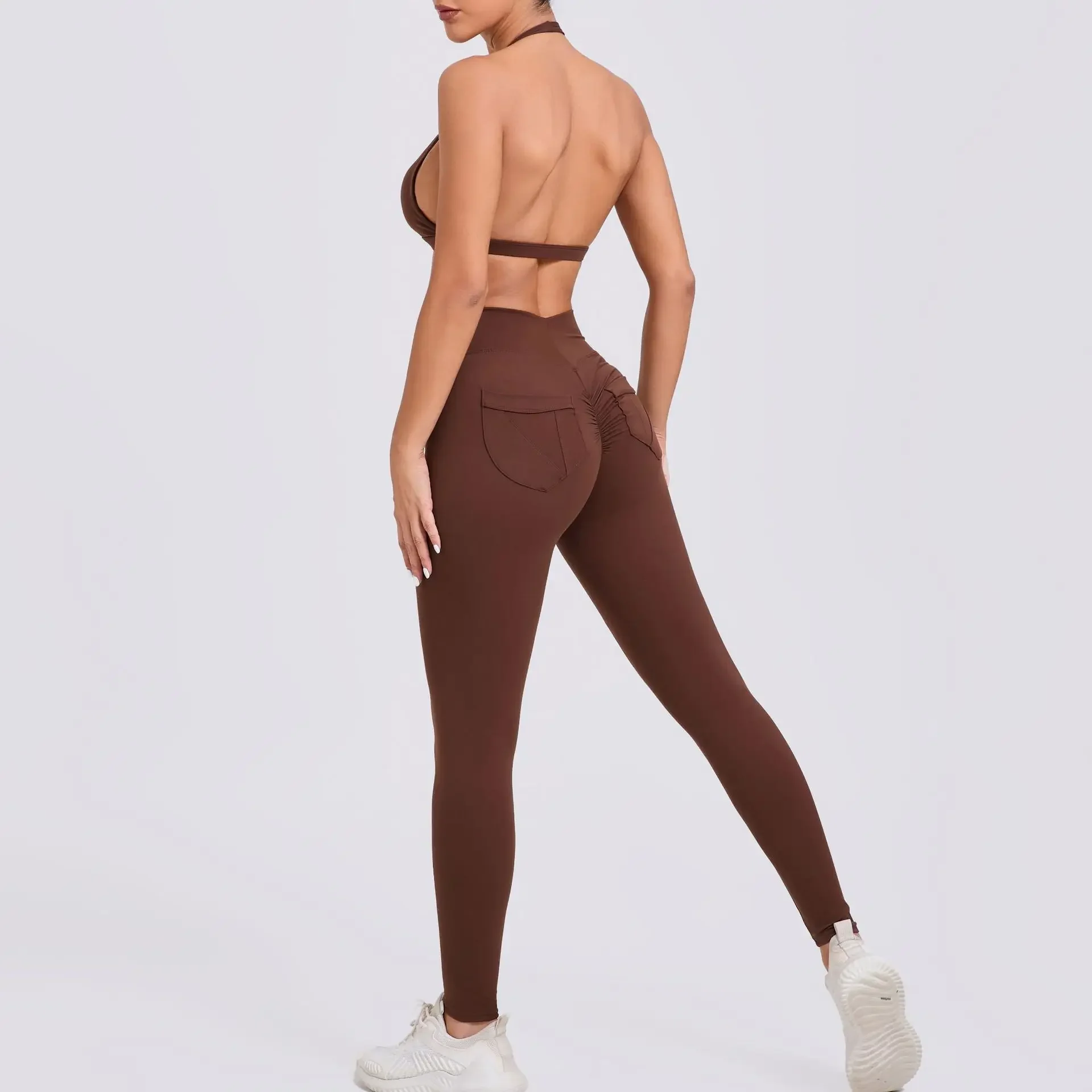 シームレスヨガセットスポーツフィットネスヒップリフティングポケットパンツビューティーバックホルターブラジャースーツワークアウトジムレギンスセット女性用