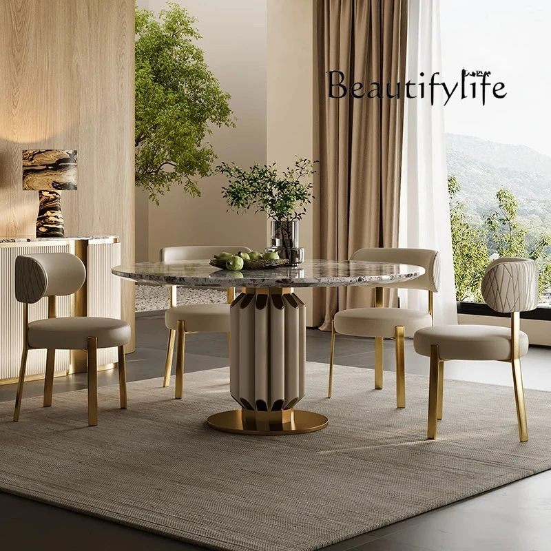 

Light luxury dining table and chairs table haute couture villa luxury house Italian marble luxury stone round dining table