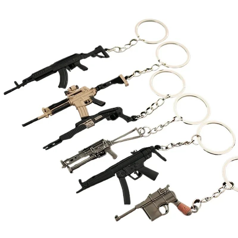 Nova arma de metal chaveiro pubg ak 47 mini glok arma modelo liga pistola luz chaveiro pingente presente brinquedo coleção