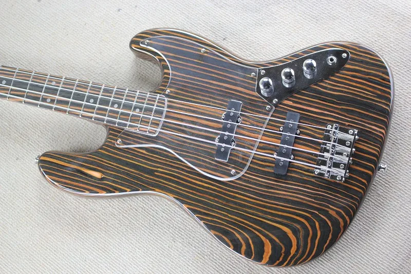 custom 4 string bass guitar, zebra pinto wood body,HH pickups,acrylic pickguard,chrome button,neck bolt on body