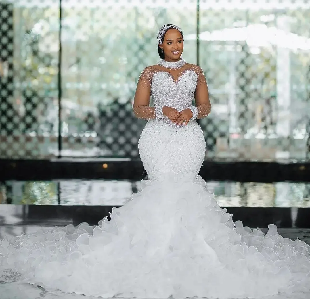 

Sparkly Crystals Bead Wedding Dress 2026 High Neck Sleeves Illusion Back Buttons Sequined Ruffles Church Bride Bridal Gowns