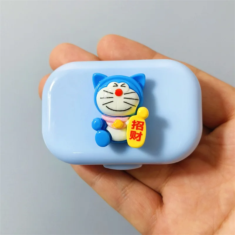 Doraemon Robot Cat Contact Lens, banc de boîte d'acceptation, dessin animé, bref, portable, compact, chanceux, richesse, article mignon, nouveau, 2024