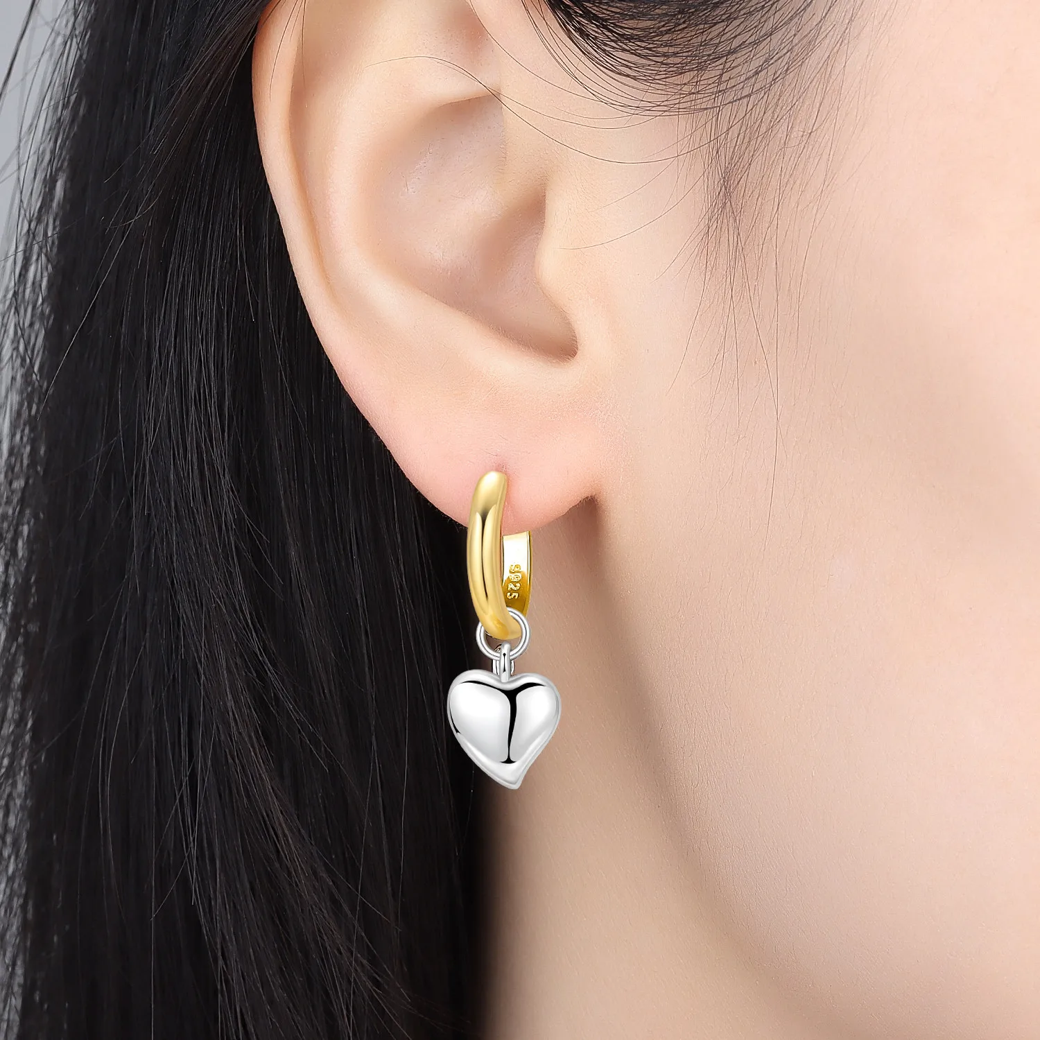 Elegant heart earrings for women featuring gold and silver heart-shaped designs, perfect for gifting and everyday fashion from VelmoraMart.