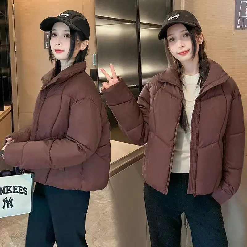 เสื้อโค้ทกันหนาวผู้หญิง แขนยาว คอตั้ง ทรงหลวม บุใยฝ้าย หนานุ่ม อุ่นสบาย สไตล์ลำลอง ปี 2025