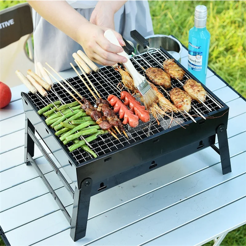 

2024 New Creative Outdoor Barbecue Portable Thickened Folding Stainless Steel Charcoal Barbecue Oven Camping