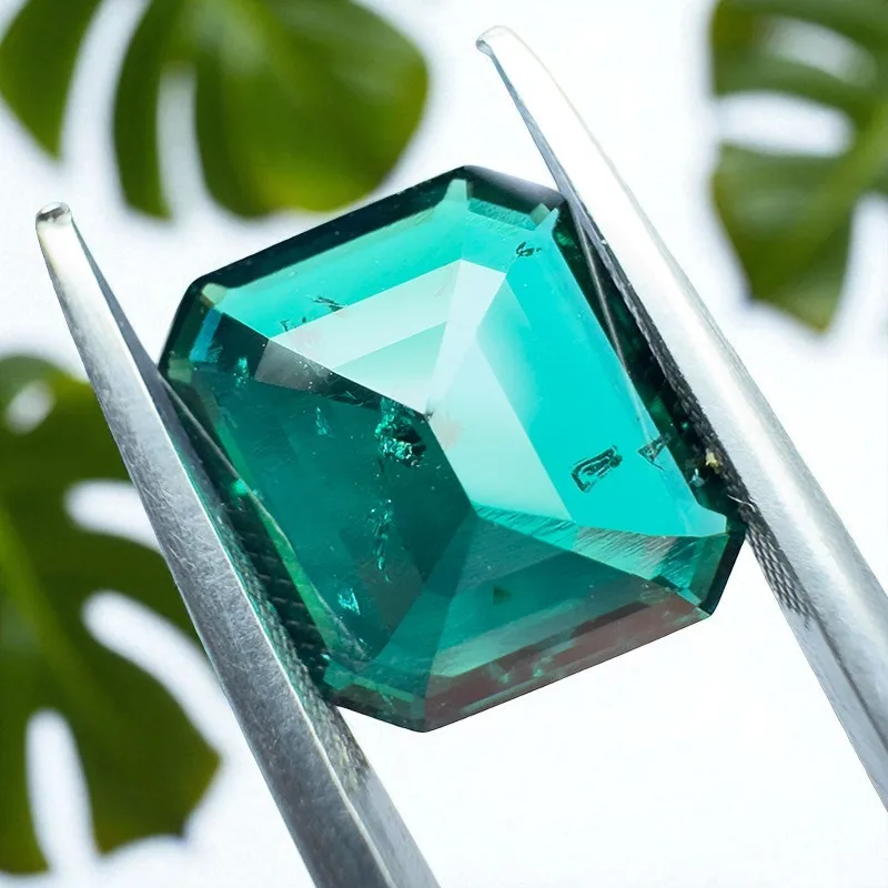

Lab Grown Zambian Emerald- Hydrothermal, Hand-Cut, Emerald Cut, with Cracks Inclusions, With AGL Certificate For Jewelry